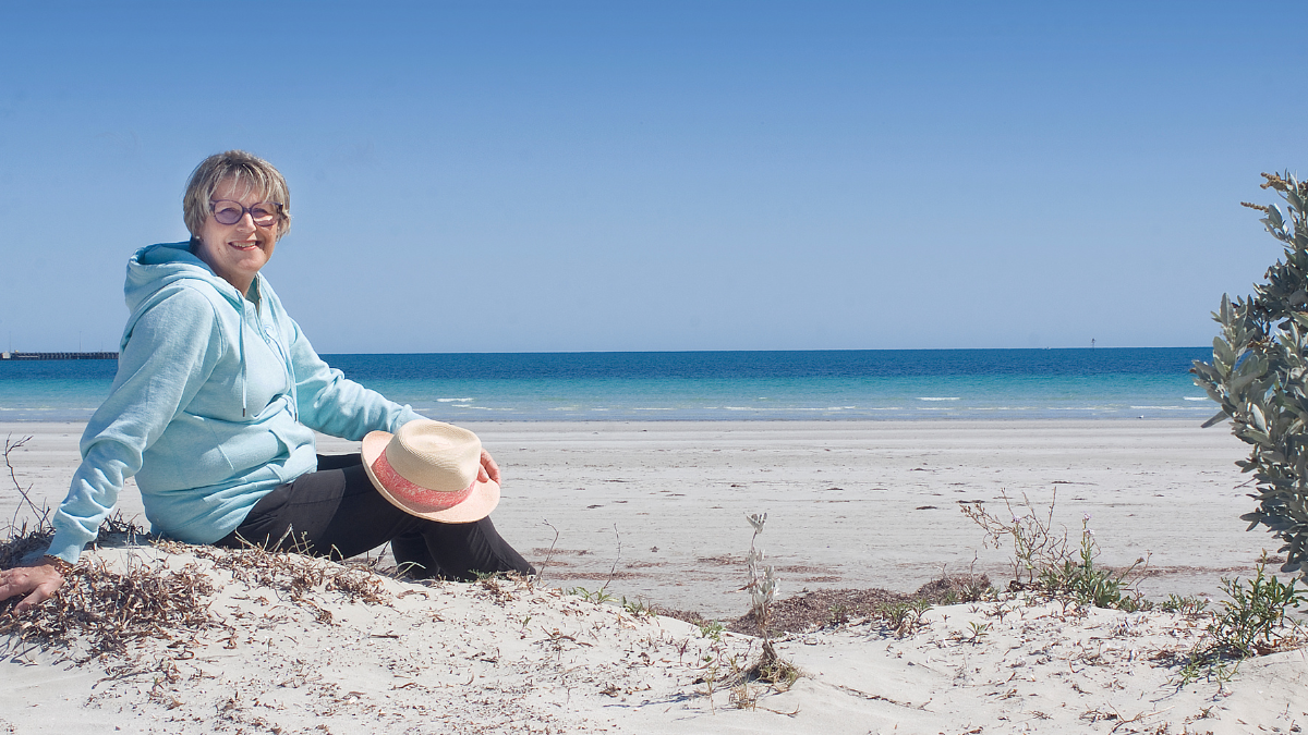 Woman by the beachside